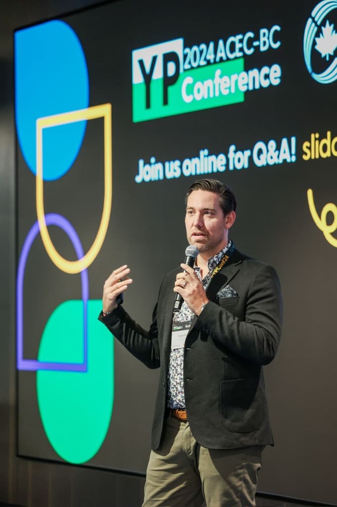 Colin Cox speaking on stage